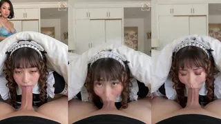Foto POV. Scena in camera da letto, c'è una giapponese di 18 anni con un vestito nero e